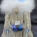 Close up ov Light Blue and Grey Lady Gnome Wine Bottle Decoration with Winter Accents