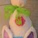 Close up of bow painted green and polka dot hat
