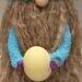 Close up of Easter Bunny Wine Bottle Gnome Egg and Flowers on Hands