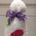 Close up of lace bow painted purple