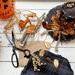 This shows some of the items I use to make Thisbe's fall hat. Is shows up-cycled black flannel, natural burlap, leaves, and berries.