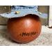 This image shows Peach's name engraved onto the back of the gourd shell. I use pyrography tools to burn the letters onto the gourd.