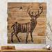 This is a large wood wall hanging featuring a deer with antlers. The artwork is wood burned by hand onto a pallet of reclaimed fence. 