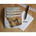 Express yourself with this cute set of 5 blank doggie cards sporting the face of a brown puppy dog reclining on some pillows.