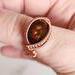 Copper Wire Wrapped Fire Agate Gemstone Ring on Finger