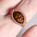 Copper Wire Wrapped Fire Agate Gemstone Ring on Finger