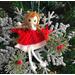 This is another version of our petite handcrafted dolls on a snowflake and becomes an ornanebt,  This doll is different in that she has braids and red bows.  She dress is red with white trim and she is playing her little silver flow. The measurements are: Snowflake is :3.5"  and Doll 2.5"