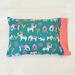 Organic cotton handmade pillowcase on jeweled toned fabric featuring elephants