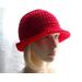 This Snazzy Hat is bright red, and the brim is turned up in back to create a fedora.