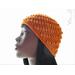 Cute little mock bobbles dot the sides of this Bitsy Bobbles Beanie, creating a delicious textured hat in tangerine.