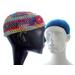 Mannequin in front wears a colorful kufi-style beanie that is adorned with a big red button.  The mannequin in back is wearing a solid blue Shorty B.