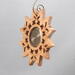 Handmade Wood Photo Ornament: A personalized holiday decoration crafted from maple wood, featuring a hand-cut design and a customizable photo insert. Perfect for adding a personal touch to your Christmas tree or holiday décor. A unique and thoughtful gift that will become a cherished keepsake for years to come.