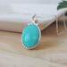 Sleeping Beauty Turquoise Pendant 16x12 in Sterling Silver