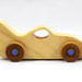 Handmade wooden toy bat car with a clear and amber shellac finish and metallic sapphire blue trim, part of my Play Pal Collection