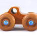 Handmade Wooden Toy Monster Pickup Truck with large wheels Made From Laminated Hardwoods and Finished With Amber Shellac and metallic Sapphire Blue From My Play Pal Collection