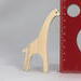 Handmade wood toy Giraffe cutout, crafted in a Toymakers Shop from high-quality, unfinished wood. Freestanding and stackable, part of the Itty Bitty Animal Collection. Perfect for creative painting and imaginative play.