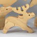 Handcrafted wood moose family stacking puzzle, ideal for children of all ages. Created in a traditional Toymakers Shop using woodworking tools, each piece is meticulously sanded and finished for lasting beauty and durability.