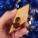 Handmade Wood Birdhouse Ornament Collectable Christmas Tree Ornament shapeed like a Christmas tree. Made from select-grade hardwoods, hand-sanded, and finished with a custom blend of oils and waxes using traditional woodworking tools.