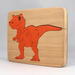 Handmade Wood Dinosaur Tray Puzzle with Amber Shellac and Orange Paint Finish. Freestanding and Versatile Toy for Kids of All Ages, Crafted in the USA with Traditional Woodworking Tools.