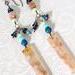 Handmade long flower agate gemstone earrings, with garnets, apatite, and sunstone beads.