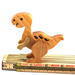 A wooden baby dinosaur figurine handmade and finished from select-grade hardwoods. It is an excellent toy for kids of any age. It is one of several dinosaurs in my collection.