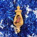 Handmade Wood Birdhouse Ornament Collectable Christmas Tree Ornament shapeed like a Christmas tree. Made from select-grade hardwoods, hand-sanded, and finished with a custom blend of oils and waxes using traditional woodworking tools.