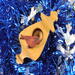 Handmade Wood Birdhouse Ornament Collectable Christmas Tree Ornament shapeed like a Christmas tree. Made from select-grade hardwoods, hand-sanded, and finished with a custom blend of oils and waxes using traditional woodworking tools.