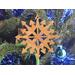 Handmade Snowflake Style Christmas Tree Ornament crafted from reclaimed wood, lightly sanded, and finished with clear shellac. A rustic holiday decor choice, perfect for gifting. Upcycled materials contribute to its environmentally friendly design.