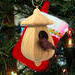 Handmade Wood Birdhouse Ornament Collectable Christmas Tree Ornament shapeed like a Christmas tree. Made from select-grade hardwoods, hand-sanded, and finished with a custom blend of oils and waxes using traditional woodworking tools.