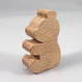 Handcrafted bear made from unfinished wood, created using traditional woodworking tools. Sanded and ready for painting, this free-standing bear can be stacked or used in pretend play with similar animals.