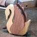 Handmade wooden swan figurine crafted from contrasting reclaimed hardwoods, sanded and ready to finish, and made in the USA.
