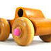 Handmade Wood Toy Pickup Truck with large wheels finished with amber shellac and pink trim. It is my Play Pal Collection's perfect push toy for small kids.
