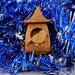 Handmade Wood Birdhouse Ornament Collectable Christmas Tree Ornament shapeed like a Christmas tree. Made from select-grade hardwoods, hand-sanded, and finished with a custom blend of oils and waxes using traditional woodworking tools.