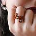 Copper wire wrapped three stone Labradorite Ring on Finger