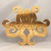 A handcrafted octopus puzzle made from wood. The puzzle is freestanding and can comfortably sit on a shelf, table, window sill, or door frame.