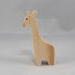 Handmade wooden giraffe cutout, unfinished, ready to paint, and freestanding. Perfect for a young child's imaginative play, stacking, or crafting.