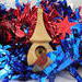 Handmade miniature birdhouse Christmas tree ornament made from select-grade hardwoods.