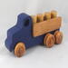 This handmade wooden Lorry truck is finished with navy blue acrylic paint and Amber Shellac. It is one of five towable trucks in this collection, available in many colors and unfinished. Custom Orders are welcome.