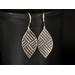 Oxidized sterling silver earrings marquise shaped earrings embossed with a geometric criss cross pattern.