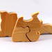 Handmade small four piece freestanding wooden kitten puzzle handfinshed with mineral oil.