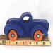 Toy Pickup Truck With Fat Fenders HanA handmade wooden toy pickup truck with large fenders, painted in nontoxic navy blue and metallic sapphire blue and finished with non-marring amber shellac on the wheels.dmade and Painted Navy Blue