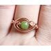Jade Copper Eye Ring in Use