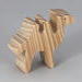 Handmade unfinished wood toy camel from the Itty Bitty Animal Collection sanded smooth and ready to paint. Ideal for kids' crafts or toys, this freestanding camel can be stacked with similar toys for a playful experience.