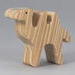 Handmade unfinished wood toy camel from the Itty Bitty Animal Collection sanded smooth and ready to paint. Ideal for kids' crafts or toys, this freestanding camel can be stacked with similar toys for a playful experience.
