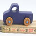 Handmade wooden toy pickup truck handmade and painted navy blue with amber shellac wheels and metallic sapphire blue trim. It's a little blue truck from my Play Pal Collection.