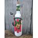 Hand painted bottle with hand made sled decorated