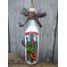 Hand painted bottle with hand made sled decorated