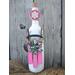 Hand painted and hand made sled, decorated, full front view of bottle