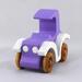A handmade wooden toy car vintage style coupe painted nontoxic purple and white with spoked wheels finished with nonmarring amber shellac, from my  Bad Bob's Custom Motors Collection.