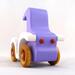 A handmade wooden toy car vintage style coupe painted nontoxic purple and white with spoked wheels finished with nonmarring amber shellac, from my  Bad Bob's Custom Motors Collection.